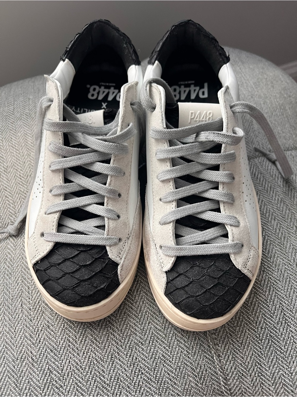 P448 Women’s Low-Top Sneakers in White and Black leather with Textured Toe.